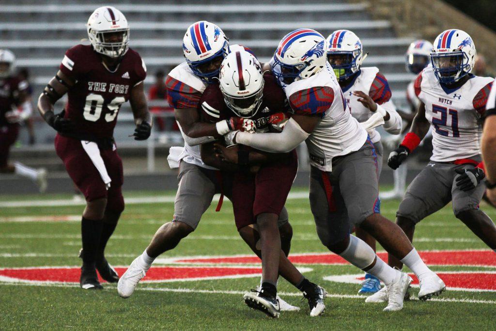 Kirmari Gainous, right, helps make a tackle against Fort Scott.