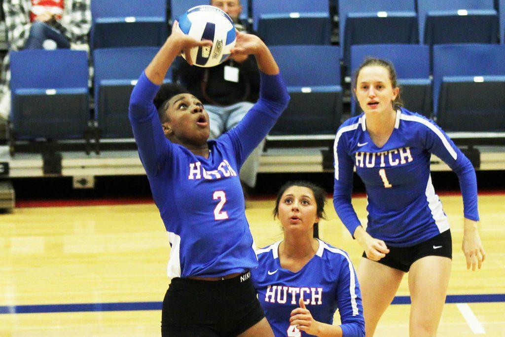 Freshman Myracle Lettries (2) sets the ball as sophomore Eboni Sapien (4) and freshman Jenna Thorne (1) back her up. The HutchCC volleyball team would go on to defeat Butler in four sets in the Region 6 Tournament