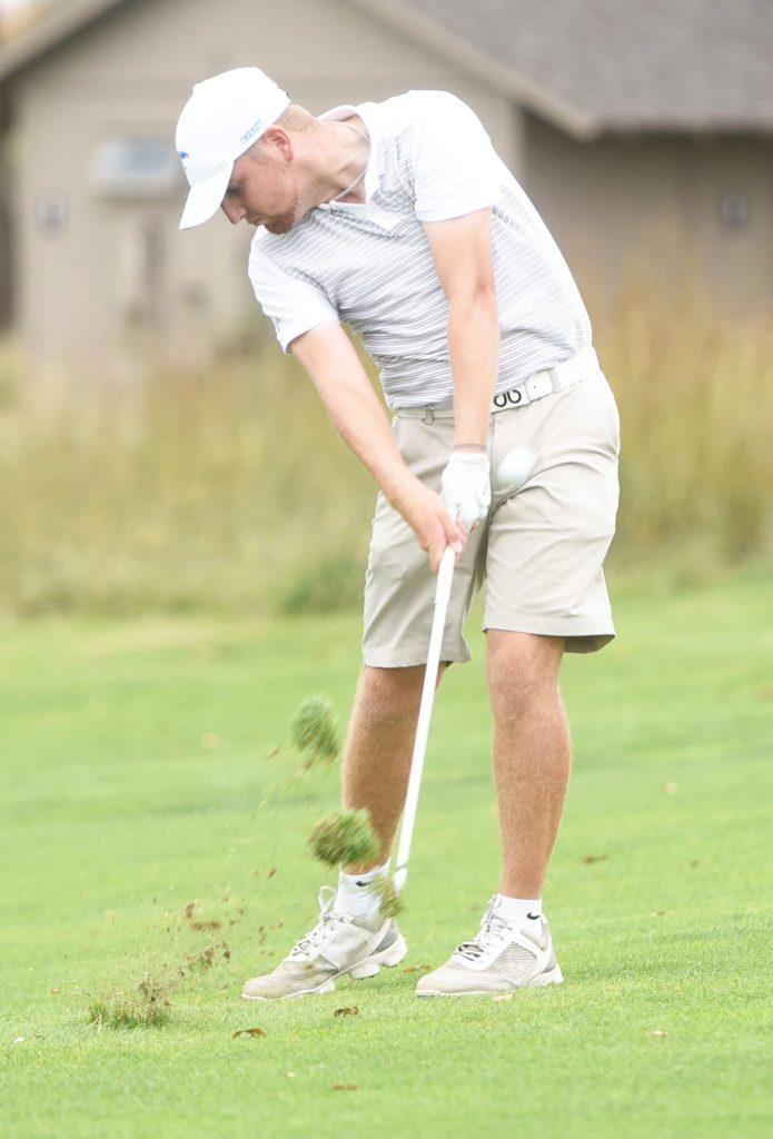 Talented Blue Dragon golfers trying best to stay in a groove during typical Kansas spring