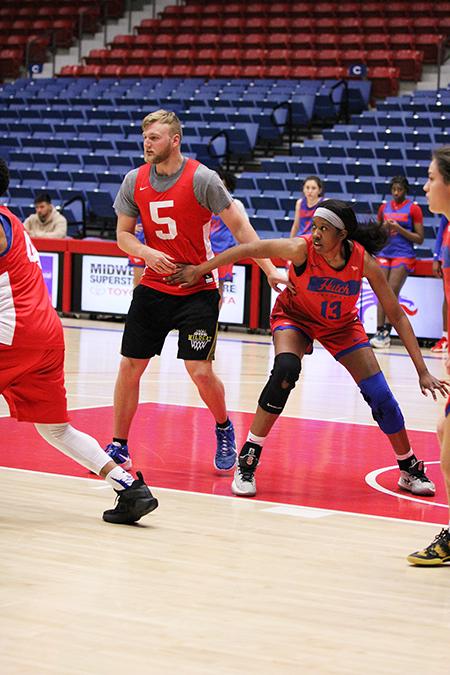 Battle of the sexes: HutchCC male students regularly scrimmage Blue Dragon women's basketball team
