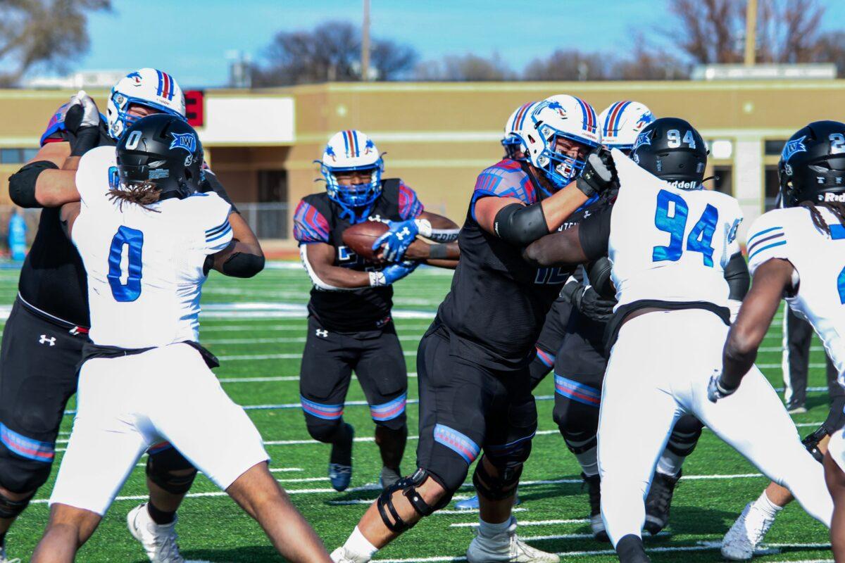 Rush hour - Blue Dragons' strong rushing attack routs the Reivers