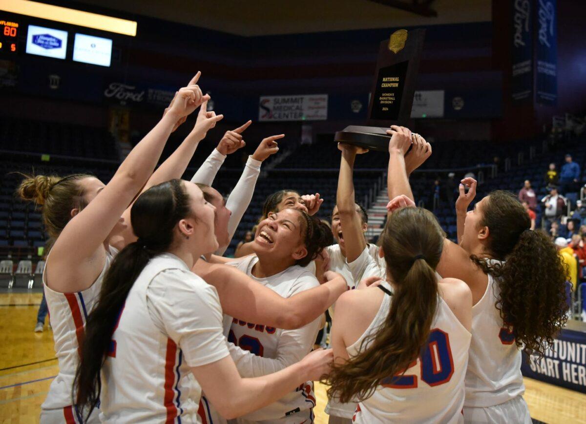 Hutchinson Community College women's basketball players celebrate after winning the NJCAA Division 1 national championship on Monday in Casper, Wyo. Photo by Sammi Carpenter/Collegian staff