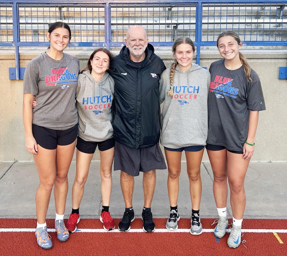 In the same Lane - Blue Dragon soccer players, coach have been a part of each others' lives for years
