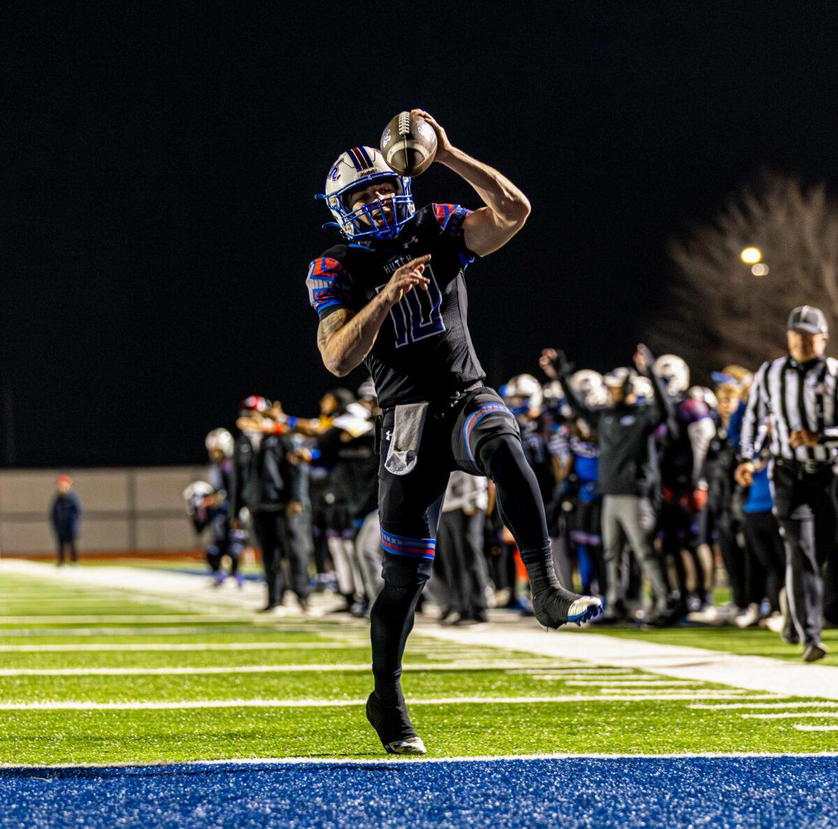 Hutchinson Community College quarterback Christian Johnson leaps into the end zone during the Blue Dragons 27-0 win over Northwest Mississippi on Saturday at Gowans Stadium. Photo by Chris Norez/Collegian