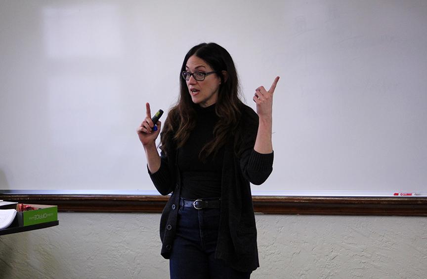 Hutchinson Community College psychology instructor Taliatha Palmer lectures one of her classes. Palmer uses interaction and games to help her students understand the human brain better. Photo by Keaton Wetschensky/The Collegian
