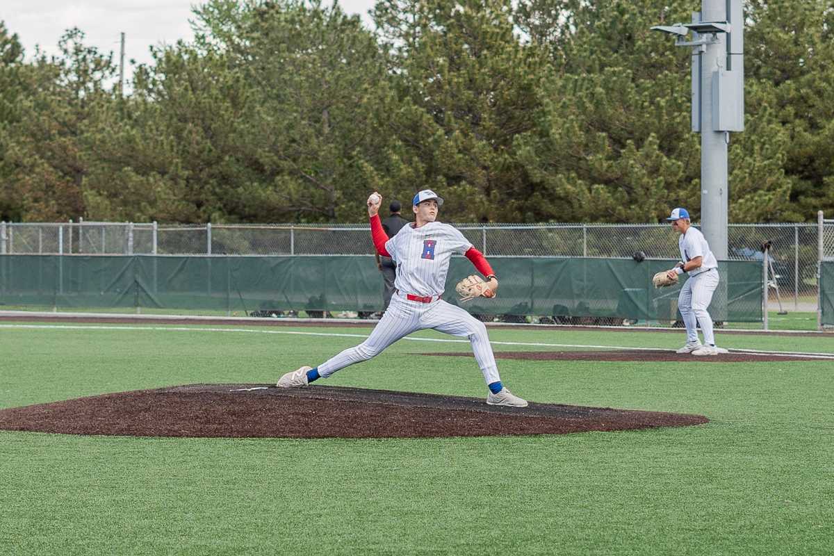 Hutchinson Community College pitcher Brayden Henry warms up during a game April 18 at Hobart-Detter Field.