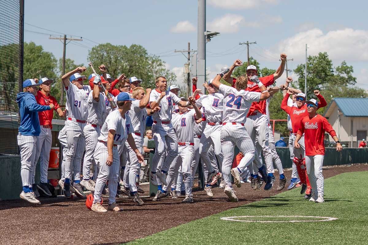 Blue Dragon baseball players celebrate a home run on April 18 against Seward County at Hobart-Detter Field. Photo by Abby Filippi/The Collegian